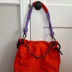 Rotunda Sant Hobo Shoulder Bag with Chain Detail in Red